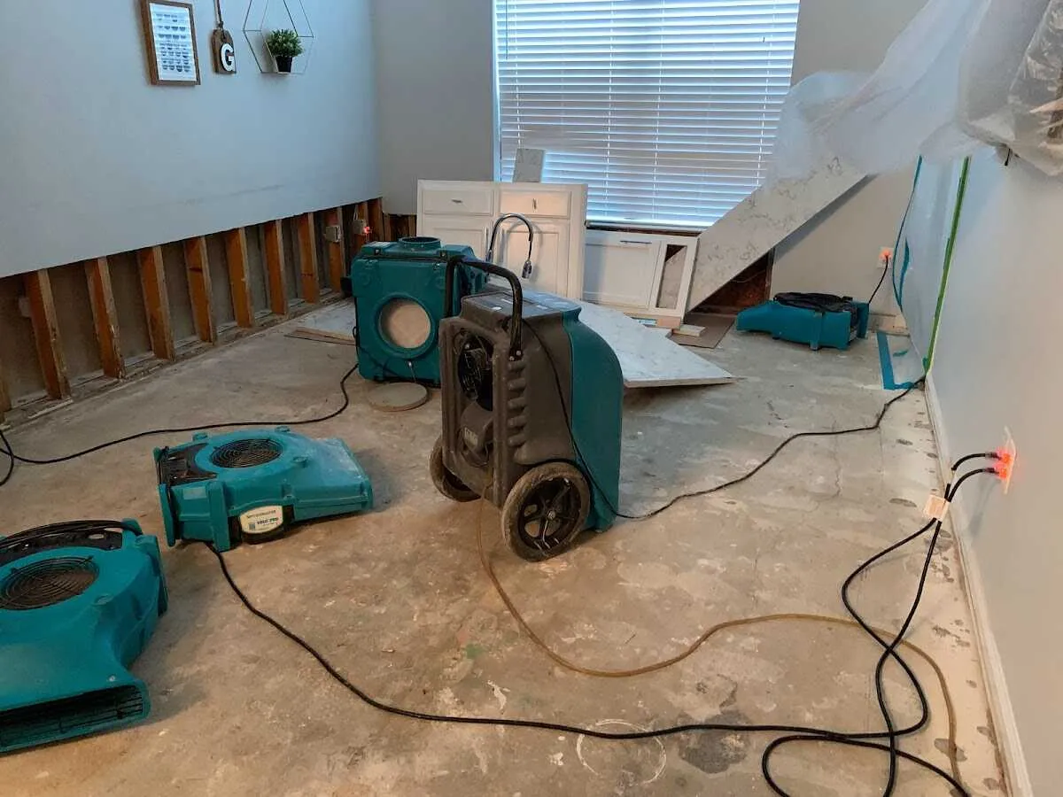 Dehumidifier in flood-cut room for Water Extraction & Removal in Clayton